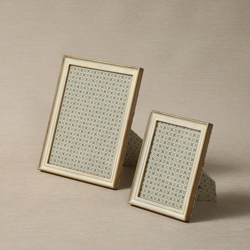 Carved white gold & cream Florentine frame